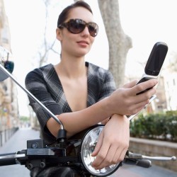 woman-on-scooter-with-mobile